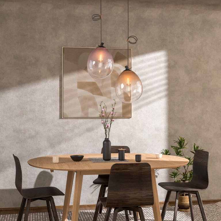 Set of Ballone designer luminaires above a modern dining table